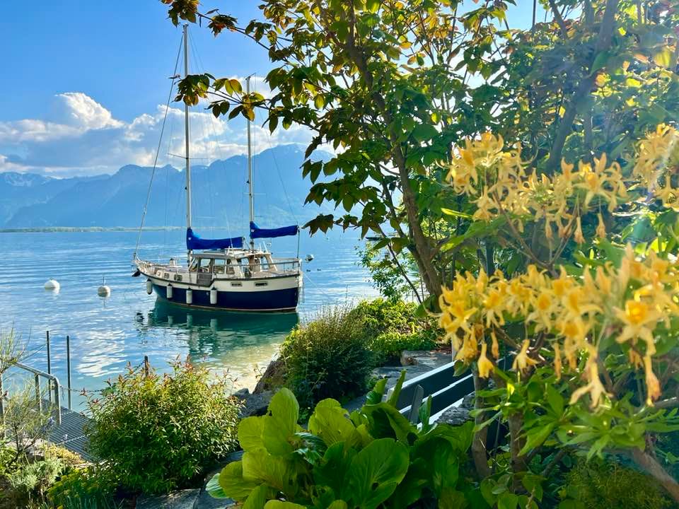 Flowers and boat at Montreux Lake Geneva Switzerland